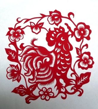 An intricate red paper cutting of a rooster surrounded by flowers in a circular composition, designed for window decoration during Chinese New Year