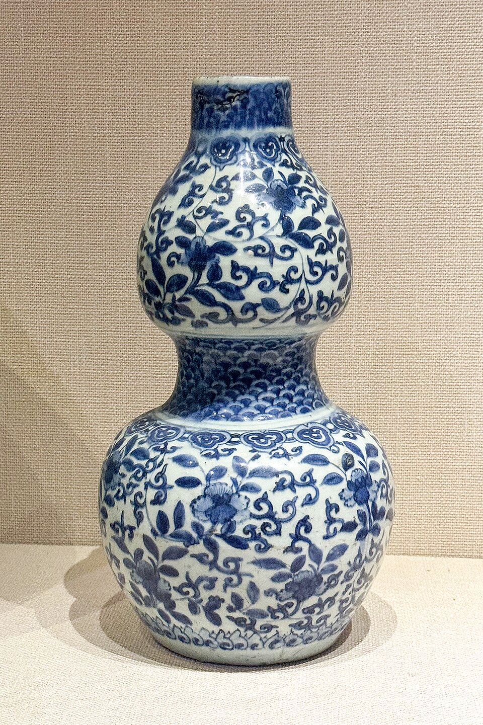 Ming dynasty blue-and-white porcelain double-gourd vase with floral scroll decoration