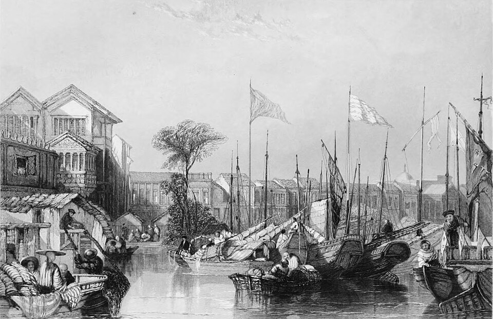 Historical painting of the Thirteen Factories in Canton showing the waterfront trading houses with various national flags