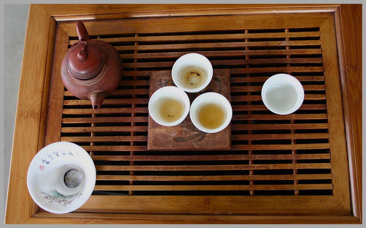 Traditional Chinese gongfu tea ceremony setup with Yixing teapot
