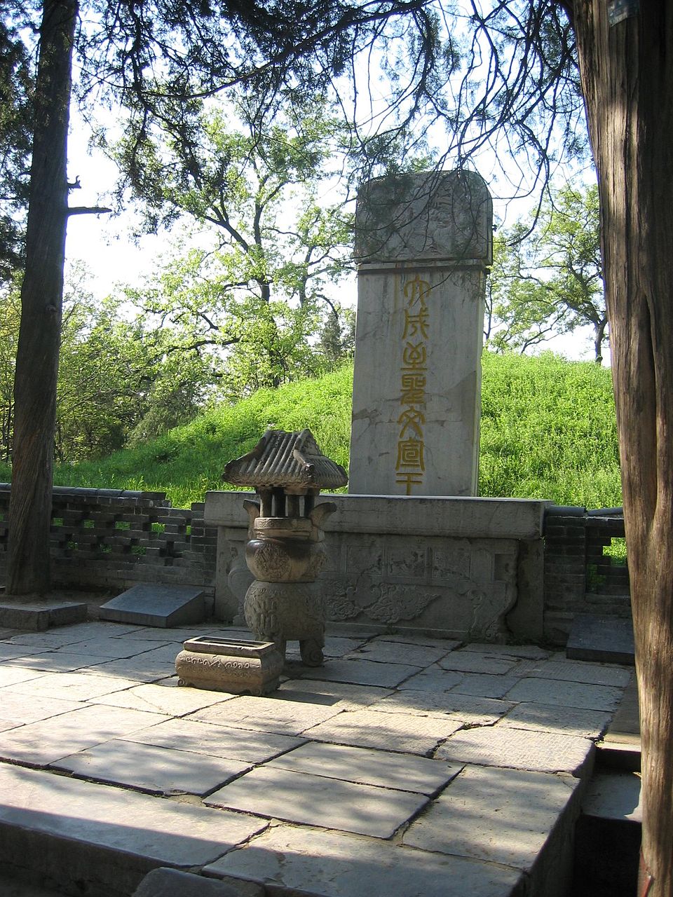 Stone stele and incense burner at the Cemetery of Confucius in Qufu, Shandong province